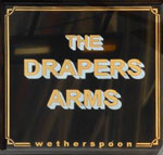 The pub sign. The Draper's Arms, Peterborough, Cambridgeshire