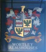 The pub sign. Wortley Almshouses, Peterborough, Cambridgeshire