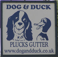 The pub sign. The Dog & Duck, Plucks Gutter, Kent