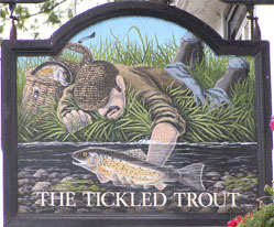 The pub sign. The Tickled Trout, Wye, Kent