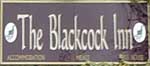 The pub sign. The Blackcock Inn, Falstone, Northumberland
