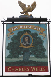 The pub sign. The Royal Oak, Bushey, Hertfordshire