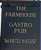 The pub sign. The Farmhouse, West Malling, Kent