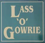 The pub sign. Lass O' Gowrie, Manchester, Greater Manchester