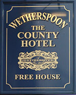 The pub sign. The County Hotel, Ashford, Kent