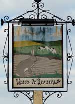 The pub sign. Hare & Hounds, Ashford, Kent