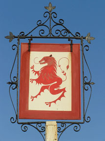 The pub sign. Red Lion, Snargate, Kent