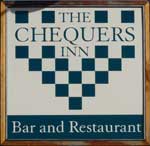 The pub sign. The Chequers Inn, Petham, Kent