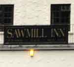 The pub sign. The Sawmill Inn, Ilfracombe, Devon