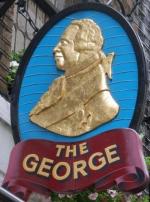 The pub sign. The George, Aldwych, Central London