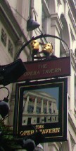 The pub sign. The Opera Tavern, Covent Garden, Central London
