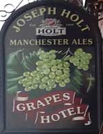 The pub sign. Grapes Hotel, Patricroft, Greater Manchester