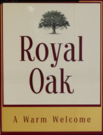 The pub sign. Royal Oak, Lydd, Kent