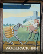 The pub sign. The Woolpack Inn, Smeeth, Kent
