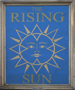 The pub sign. The Rising Sun, Kemsing, Kent