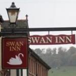 The pub sign. Swan Inn, Stroud, Gloucestershire