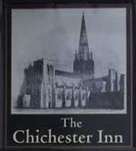 The pub sign. The Chichester Inn, Chichester, West Sussex