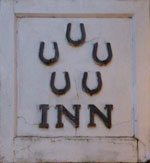 The pub sign. Five Horseshoes, Barholm, Lincolnshire