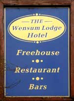 The pub sign. Wensum Lodge Hotel, Fakenham, Norfolk