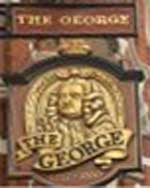 The pub sign. The George, Soho, Central London
