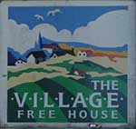 The pub sign. The Village Freehouse, Salisbury, Wiltshire