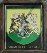 The pub sign. Sidmouth Arms, Upottery, Devon