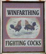 The pub sign. Fighting Cocks, Winfarthing, Norfolk