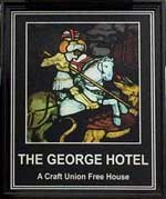 The pub sign. The George Hotel, Ashford, Kent