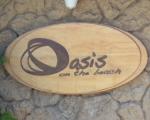 The pub sign. Oasis on the Beach, Kapaa, Kaua'i, Hawaii, America