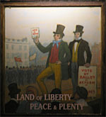 The pub sign. Land of Liberty, Peace & Plenty, Heronsgate, Hertfordshire