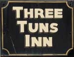 The pub sign. Three Tuns Inn, Bishop's Castle, Shropshire