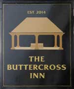 The pub sign. The Buttercross Inn, Chippenham, Wiltshire