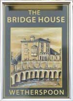 The pub sign. The Bridge House, Chippenham, Wiltshire