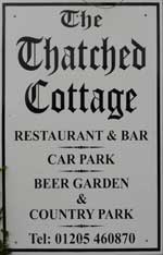 The pub sign. Thatched Cottage, Sutterton, Lincolnshire