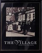 The pub sign. The Village, Walthamstow, Greater London