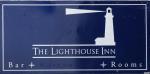 The pub sign. The Lighthouse Inn, Capel-le-Ferne, Kent