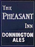 The pub sign. Pheasant Inn, Toddington, Gloucestershire