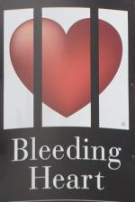 The pub sign. The Bleeding Heart Wine Bar (formerly The Bleeding Heart Tavern), Clerkenwell, Central London