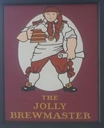 The pub sign. The Jolly Brewmaster, Cheltenham, Gloucestershire