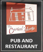 The pub sign. The Crooked House, Himley, West Midlands