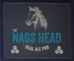 The pub sign. The Nags Head (Uttoxeter Racecourse), Uttoxeter, Staffordshire