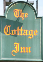 The pub sign. The Cottage Inn, Dunstan, Northumberland