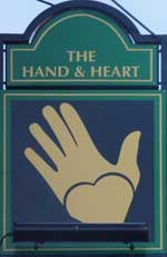 The pub sign. The Hand & Heart, Peterborough, Cambridgeshire