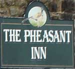 The pub sign. Pheasant Inn, Stannersburn, Northumberland