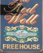 The pub sign. The Red Well, Wellingborough, Northamptonshire