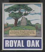 The pub sign. Royal Oak, Charmouth, Dorset