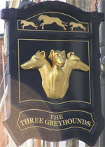 The pub sign. The Three Greyhounds, Soho, Central London