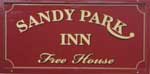 The pub sign. Sandy Park Inn, Chagford, Devon