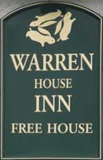 The pub sign. The Warren House Inn, Postbridge, Devon