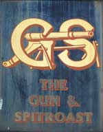 The pub sign. The Gun & Spitroast, Horsmonden, Kent